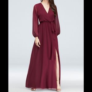 BRAND NEW long sleeve David’s Bridal gown.